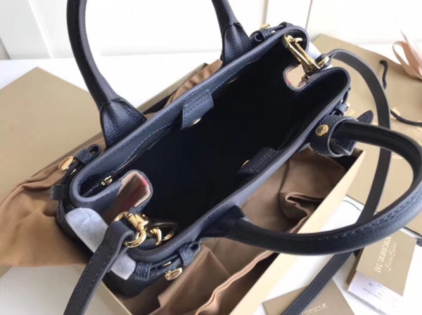 B**rry the small banner in leather and house check