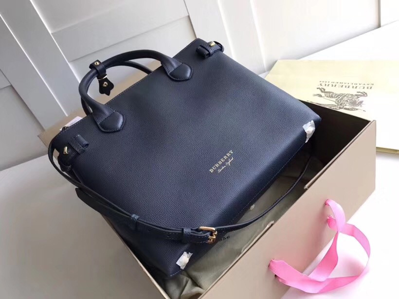 B**rry the medium banner in leather and house check